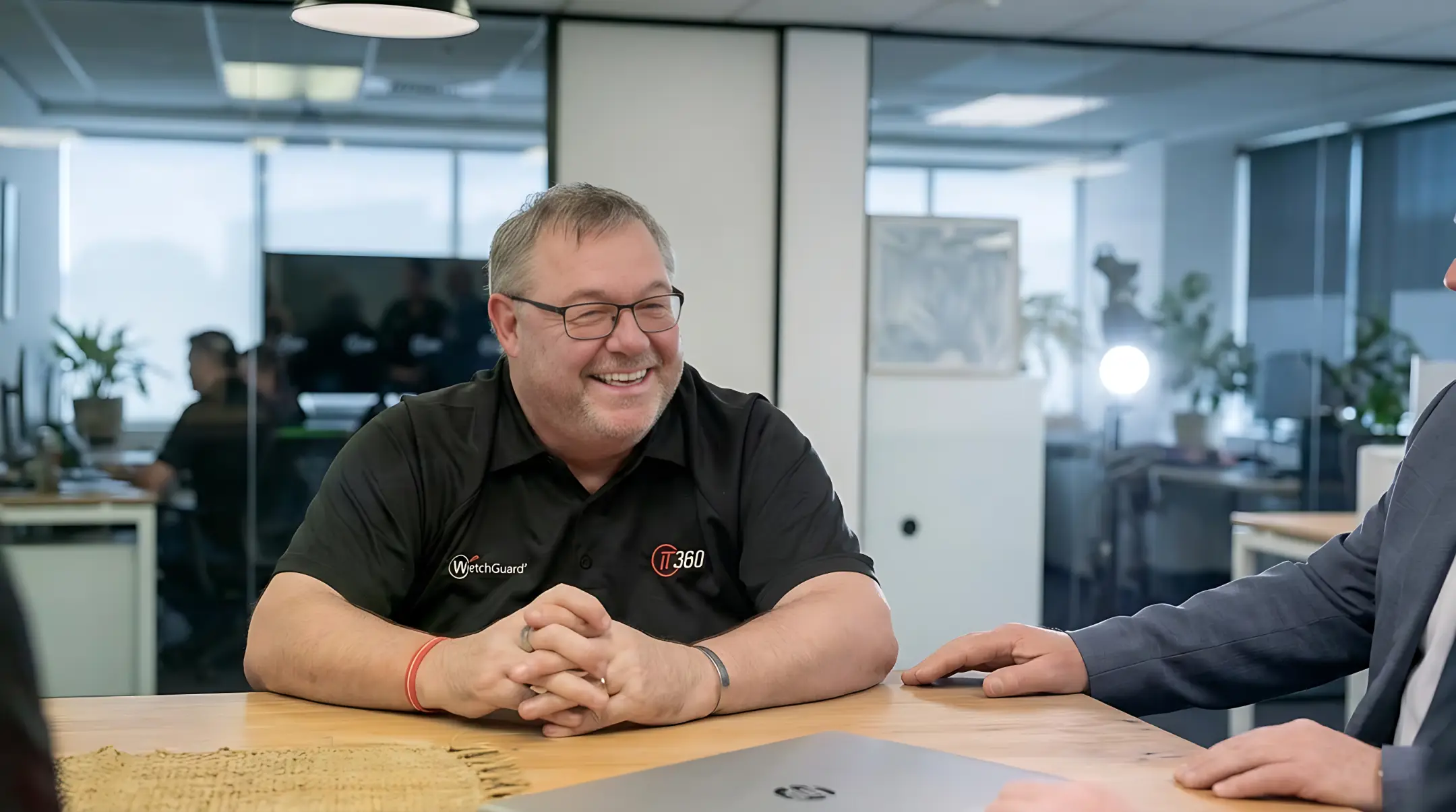 iT360 team member smiling in the office